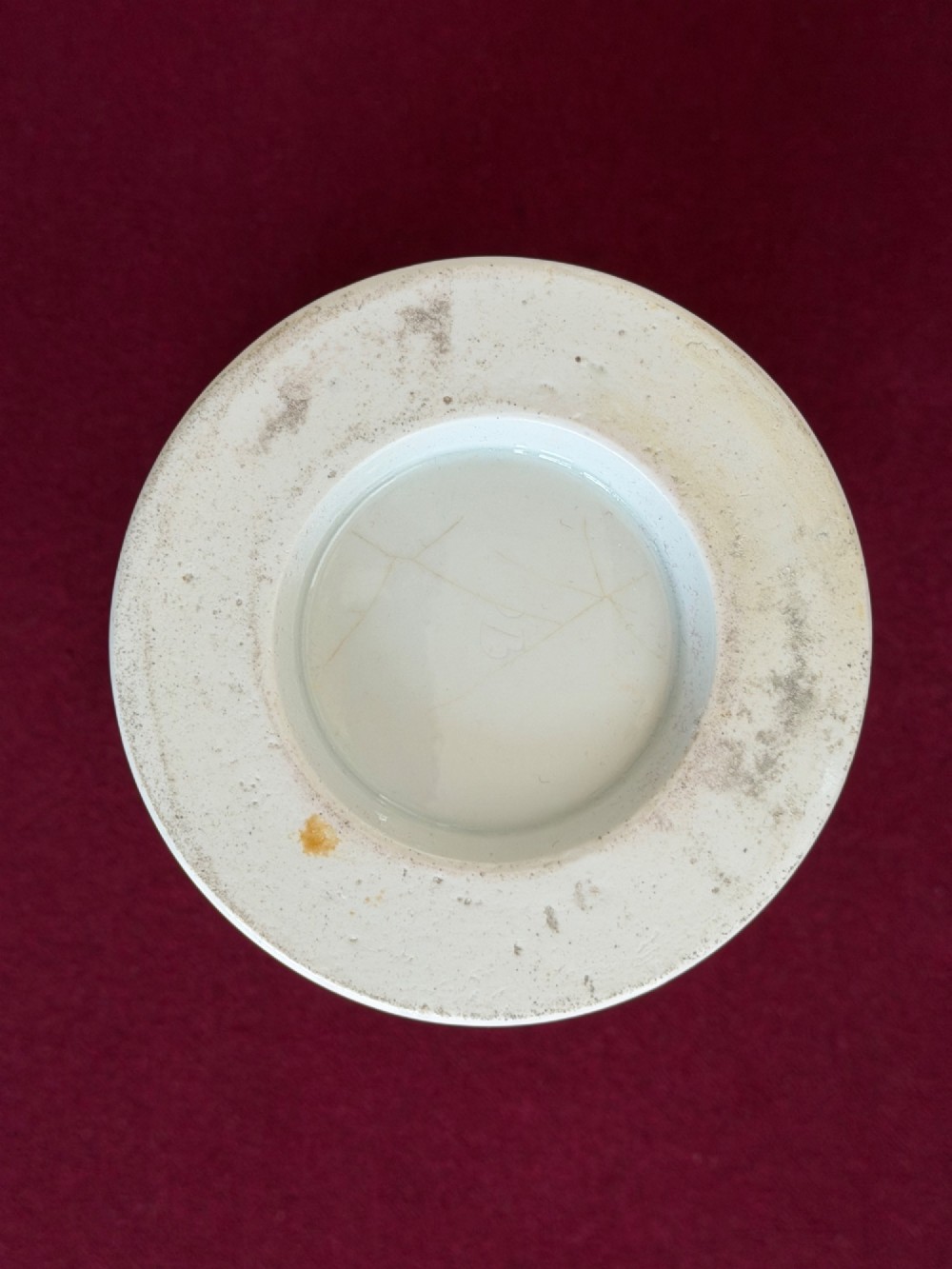 A Regency Flight & Barr Worcester porcelain jardiniere featuring an orange ground, gilt seaweed patterning, and a classical female figure painted in grisaille inside a oval frame. View II