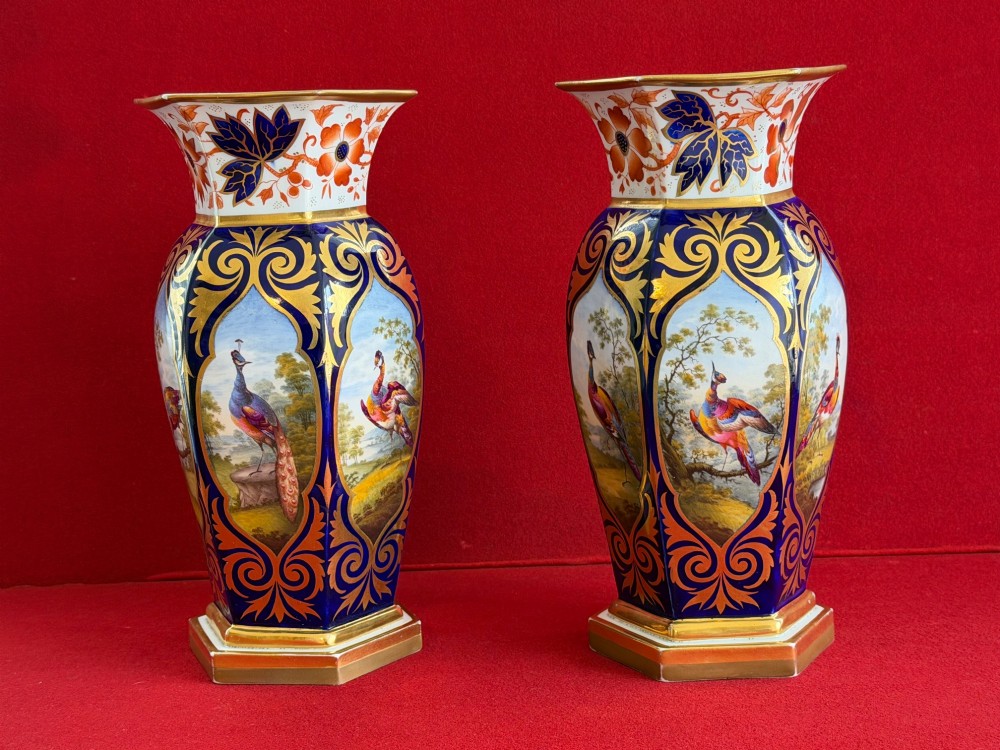 A pair of Regency period Flight, Barr & Barr Worcester porcelain vases featuring cobalt blue ground, heavy gold scrollwork, and painted exotic bird reserves. View III