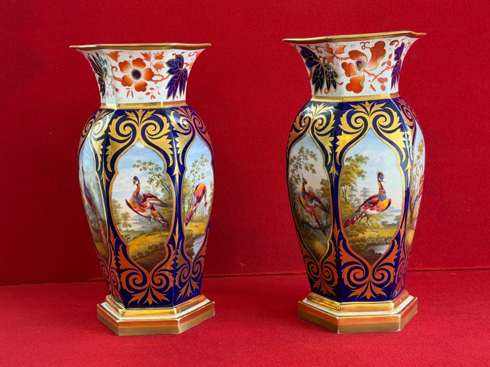 A pair of Regency period Flight, Barr & Barr Worcester porcelain vases featuring cobalt blue ground, heavy gold scrollwork, and painted exotic bird reserves. View IV