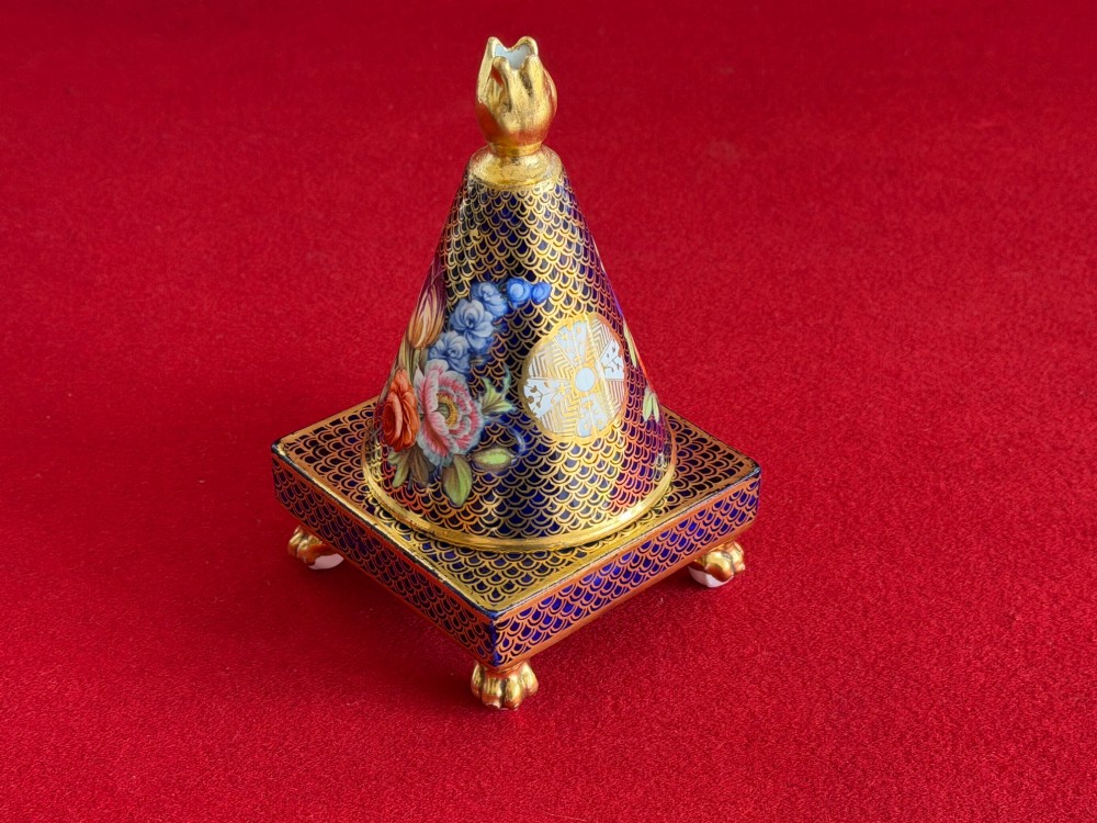 A conical Regency Spode porcelain pastille burner featuring cobalt blue scale gilding, hand-painted floral panels, and gilt paw feet on a square pedestal base. View VI