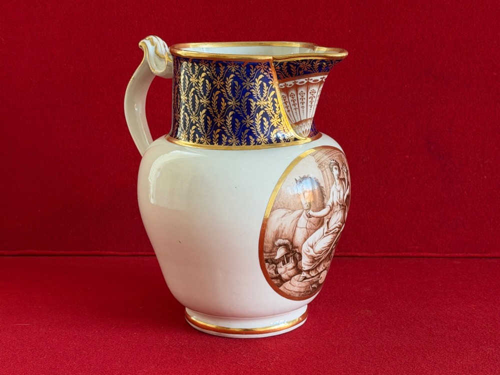 An eighteenth-century Flight and Barr Worcester porcelain jug decorated with a cobalt blue gilded collar and a sepia painted classical panel. View III
