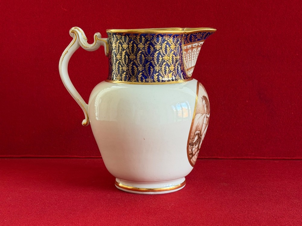 An eighteenth-century Flight and Barr Worcester porcelain jug decorated with a cobalt blue gilded collar and a sepia painted classical panel. View IV