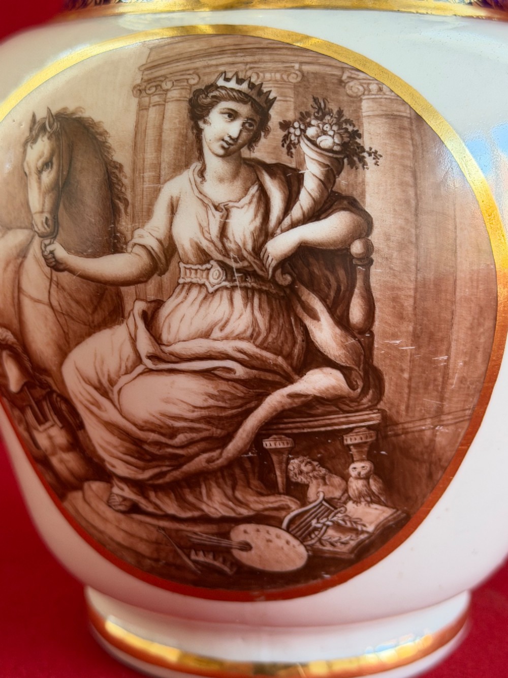An eighteenth-century Flight and Barr Worcester porcelain jug decorated with a cobalt blue gilded collar and a sepia painted classical panel. View X