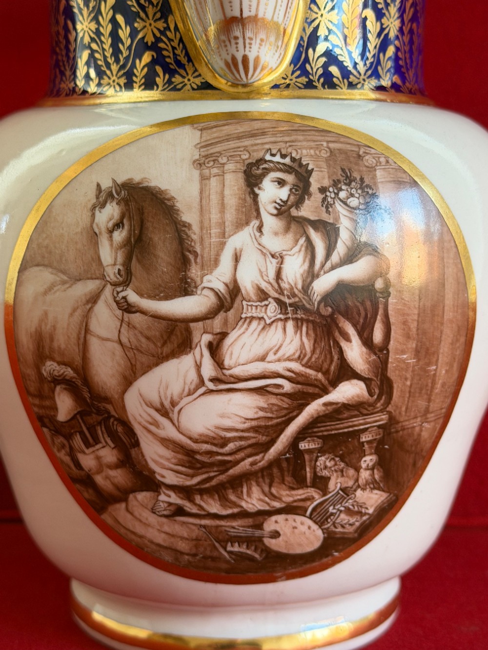 An eighteenth-century Flight and Barr Worcester porcelain jug decorated with a cobalt blue gilded collar and a sepia painted classical panel. View XI