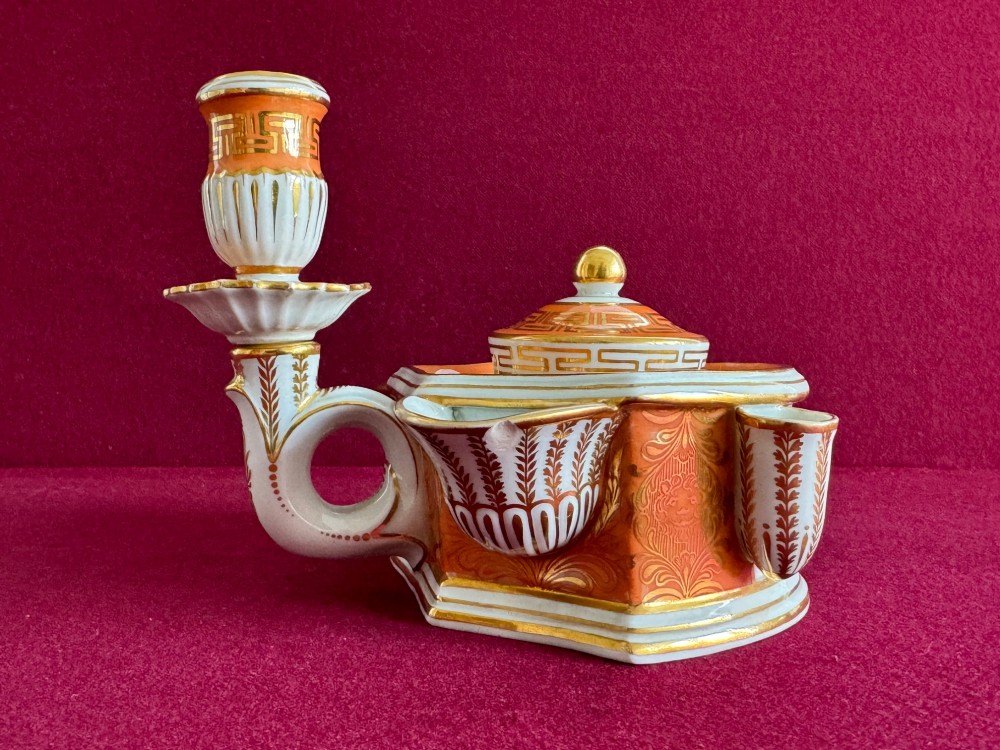 A Regency Flight & Barr Worcester porcelain inkstand painted with realistic seashell panels, gilded borders, quill holders, and a central candlestick. View II