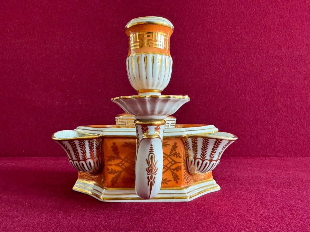 A Regency Flight & Barr Worcester porcelain inkstand painted with realistic seashell panels, gilded borders, quill holders, and a central candlestick. View III