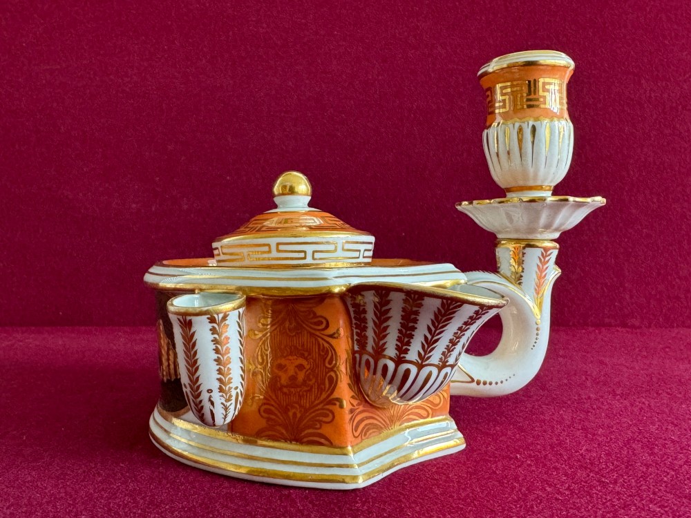 A Regency Flight & Barr Worcester porcelain inkstand painted with realistic seashell panels, gilded borders, quill holders, and a central candlestick. View IV