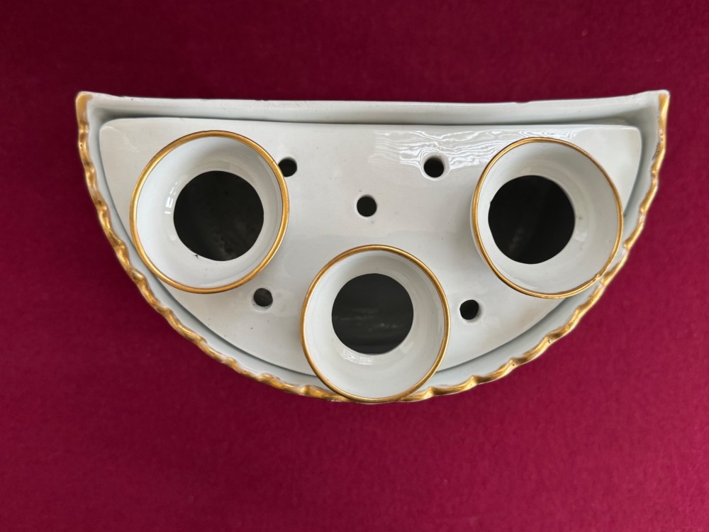 An antique Georgian porcelain bough pot decorated with a hand-painted landscape panel, gilded geometric scroll patterns, arch motifs, and gilt ball feet. View V