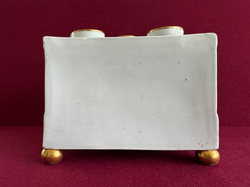 An antique Georgian porcelain bough pot decorated with a hand-painted landscape panel, gilded geometric scroll patterns, arch motifs, and gilt ball feet. View VI