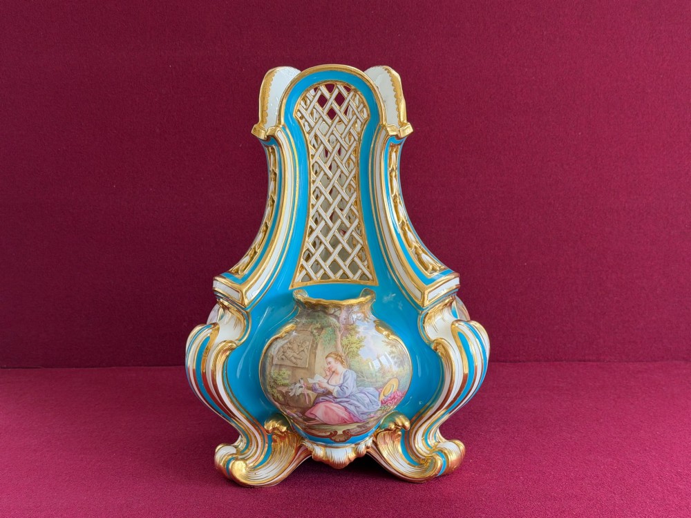 A Victorian Minton porcelain Sevres style vase featuring vibrant turquoise bleu celeste glaze, a reticulated lattice back, gilded Rococo scroll mouldings, and a hand-painted central pastoral scene. View II
