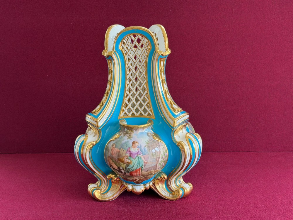A Victorian Minton porcelain Sevres style vase featuring vibrant turquoise bleu celeste glaze, a reticulated lattice back, gilded Rococo scroll mouldings, and a hand-painted central pastoral scene. View III