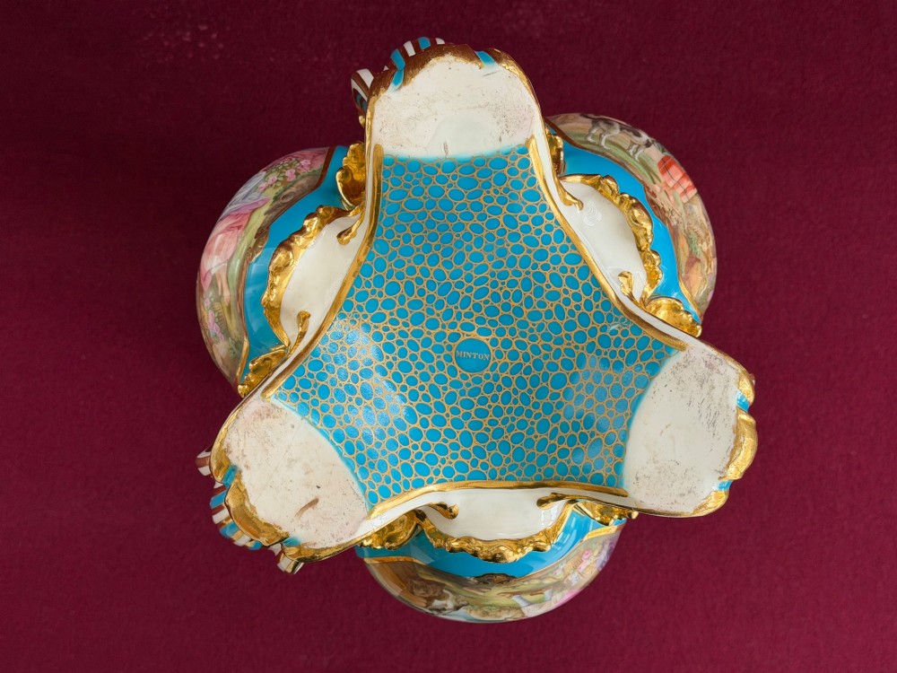 A Victorian Minton porcelain Sevres style vase featuring vibrant turquoise bleu celeste glaze, a reticulated lattice back, gilded Rococo scroll mouldings, and a hand-painted central pastoral scene. View IV