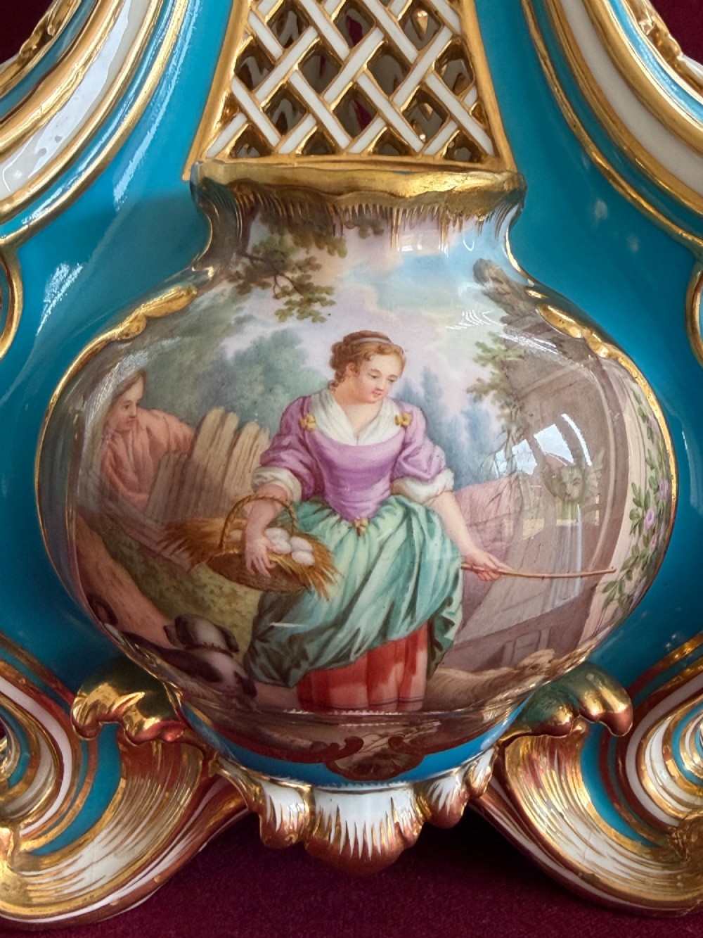 A Victorian Minton porcelain Sevres style vase featuring vibrant turquoise bleu celeste glaze, a reticulated lattice back, gilded Rococo scroll mouldings, and a hand-painted central pastoral scene. View VII
