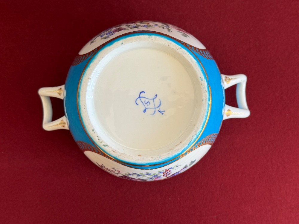 A pair of turquoise porcelain bottle coolers featuring hand-painted fruit cartouches framed by gilded scrollwork and twin handles. View VIII