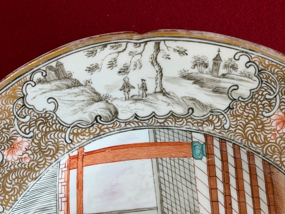 An oval Coalport porcelain meat platter decorated with hand-painted oriental figures in a landscape surrounded by a floral and gilded border. View IV