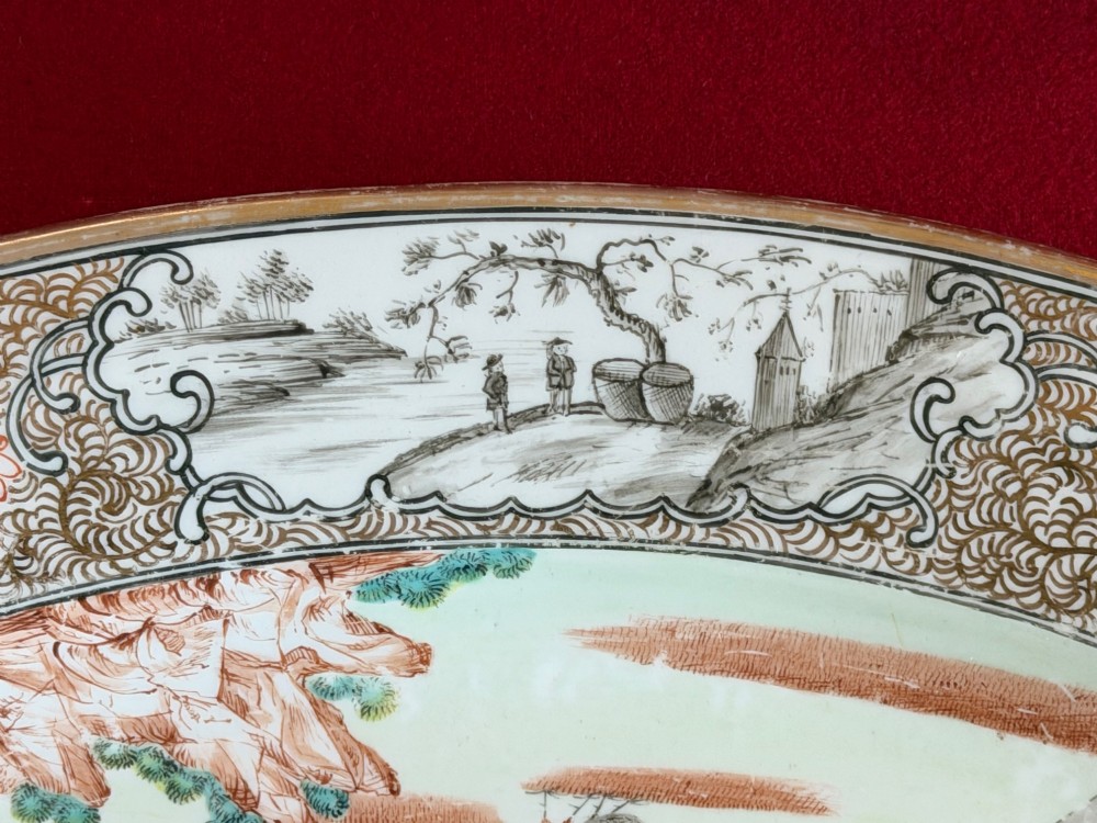An oval Coalport porcelain meat platter decorated with hand-painted oriental figures in a landscape surrounded by a floral and gilded border. View V