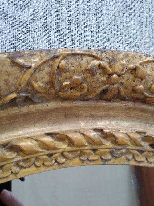 VERY EARLY CARVED GILT OVAL WALL MIRROR C1700 1720 - ADDITIONAL PHOTO 1