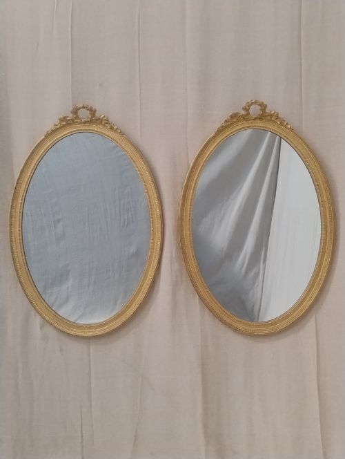 A Fine Pair of Giltwood Oval Mirrors C 1890