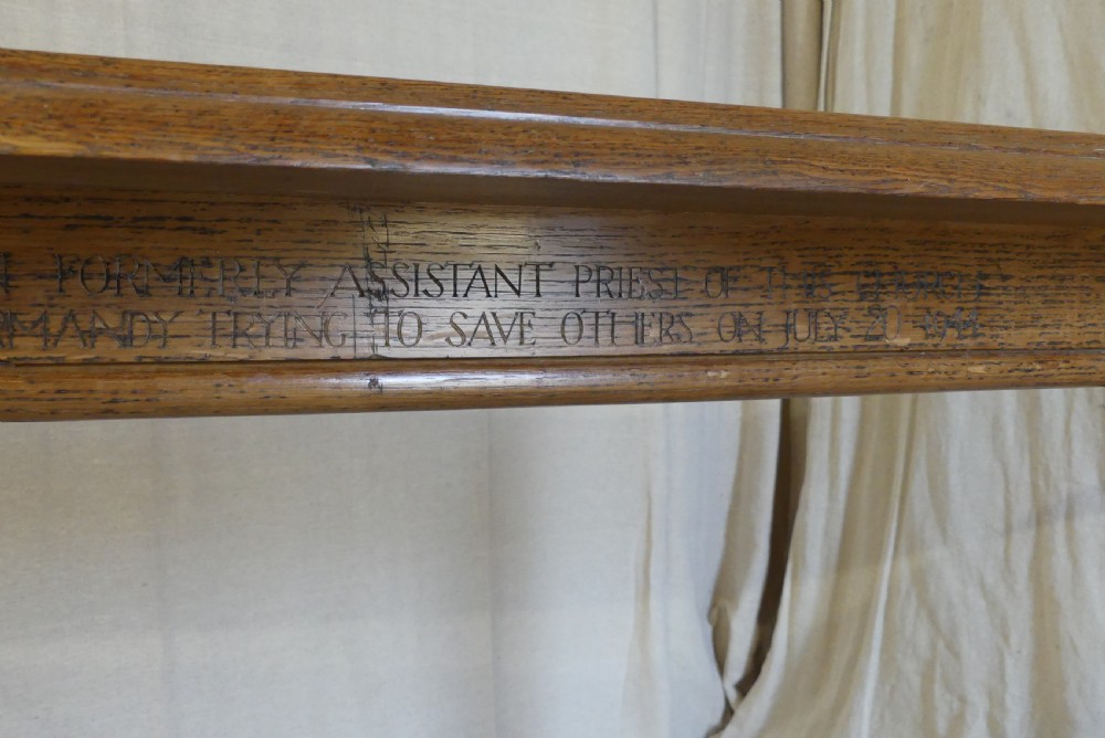 A long, narrow antique oak console table featuring a carved frieze, turned end supports, and a low central stretcher. View IV