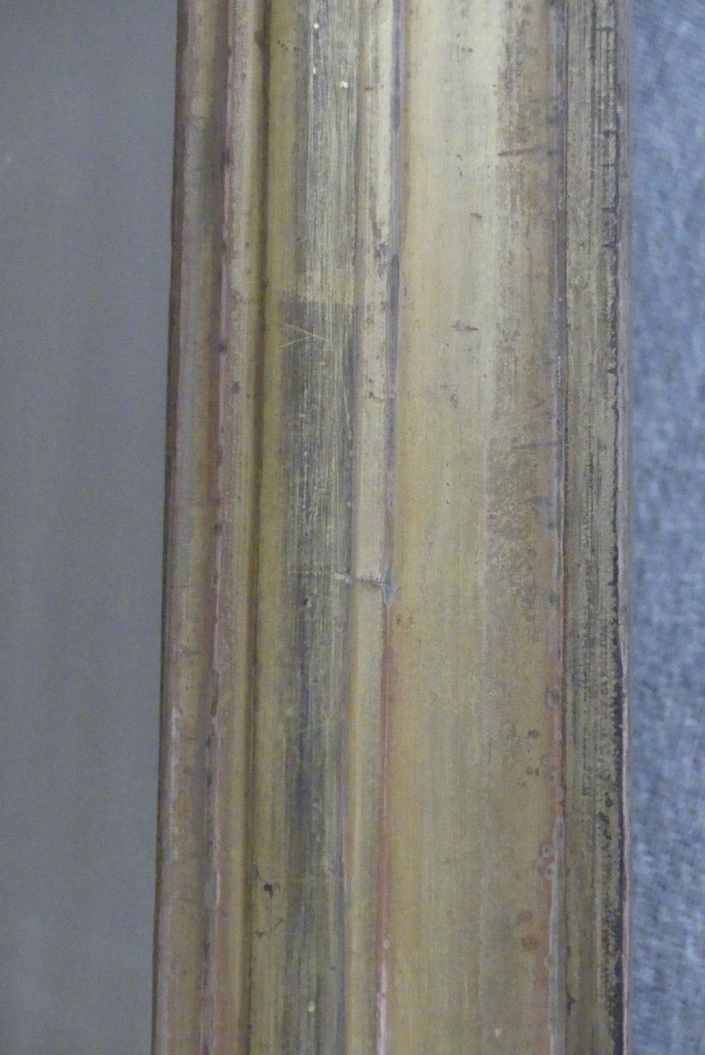 A large late 19th-century rectangular giltwood overmantel mirror featuring an arched inner frame with spandrel detailing. View IV