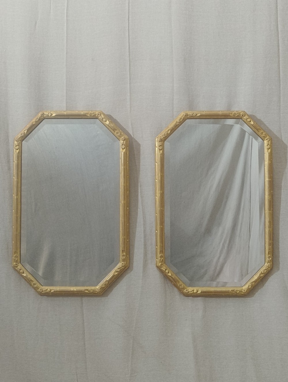 A pair of octagonal Edwardian wall mirrors with water-gilded frames and bevelled glass. View IX