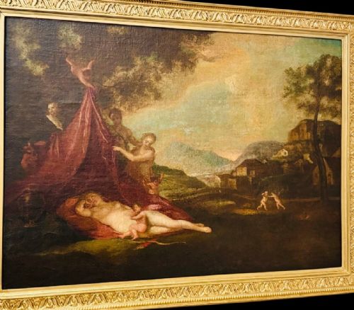 fig 3. An Italian Baroque style framed oil painting depicting a sleeping Venus alongside satyrs and cupids set within an idyllic classical landscape.