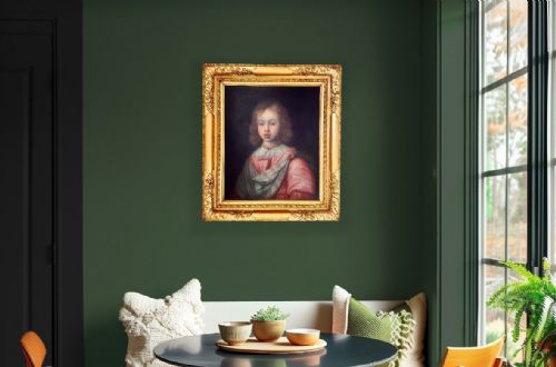 fig 1. A 17th-century oil painting depicting a young boy in a pink garment and draped blue sash, presented within a carved gilt wood frame.
