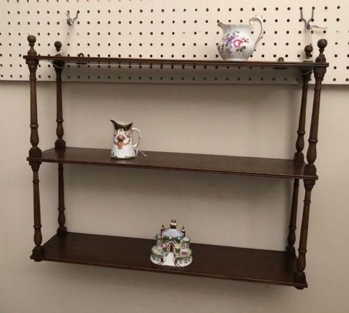 An antique English wall shelves in mahogany circa 1880