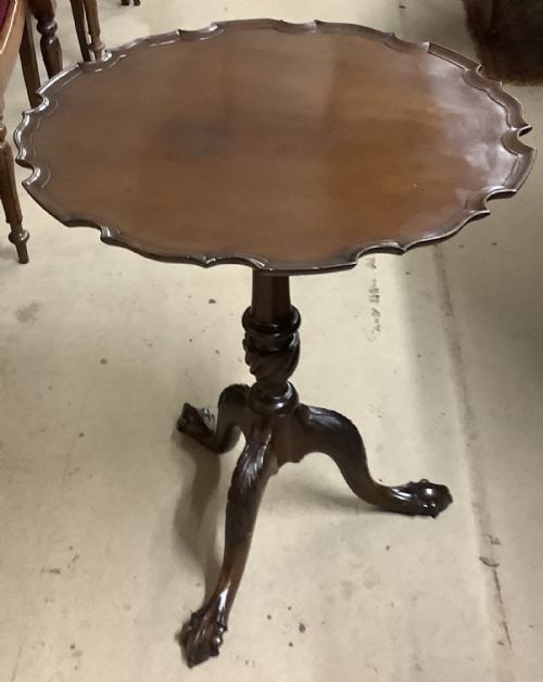 An antique mahogany tripod table circa 1890