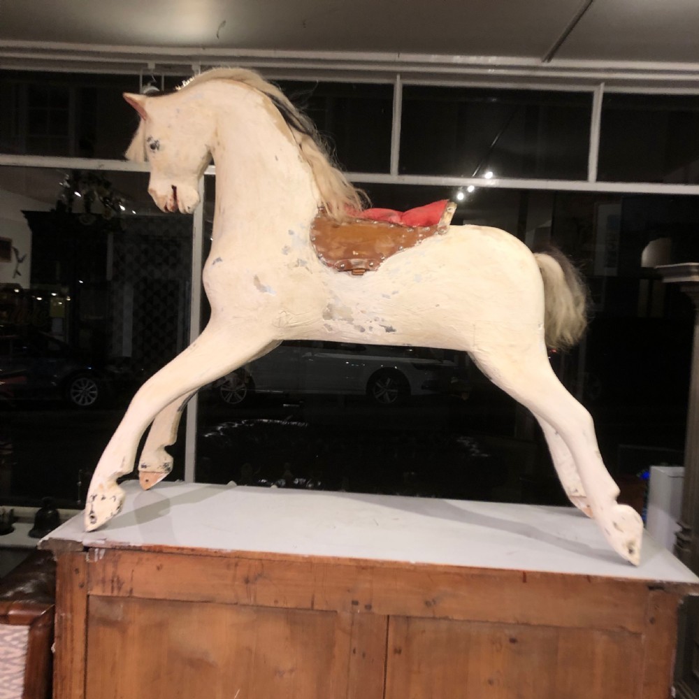 LARGE CARVED WOODEN ROCKING HORSE. View III