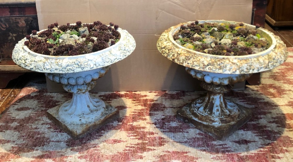 PAIR OF VICTORIAN CAST IRON URNS.
