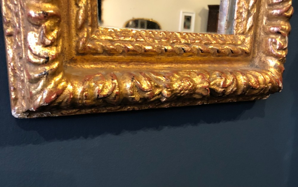 Carved and gilded 18th century Mirror. View III