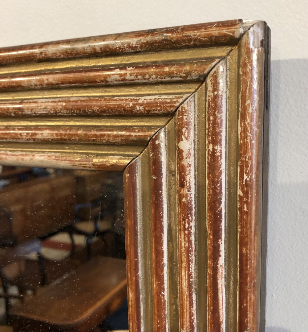 Gilded and reeded Mirror 19th century. View II