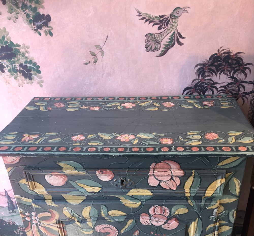 A hand-painted dark green French single-door wooden cupboard decorated with botanical foliage and bird motifs. View VI