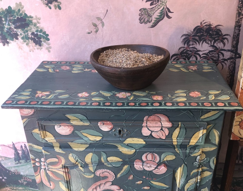 A hand-painted dark green French single-door wooden cupboard decorated with botanical foliage and bird motifs. View VII