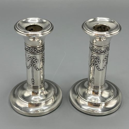 pair sterling silver candlesticks hallmarked 1905 with ribbon bow garlands - CATEGORY: ANTIQUE SILVER - DATED 1900