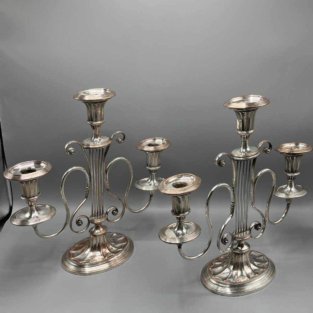 A pair of Georgian silver-plated three-light candelabra with lyre-shaped columns and scrolling branches. View III