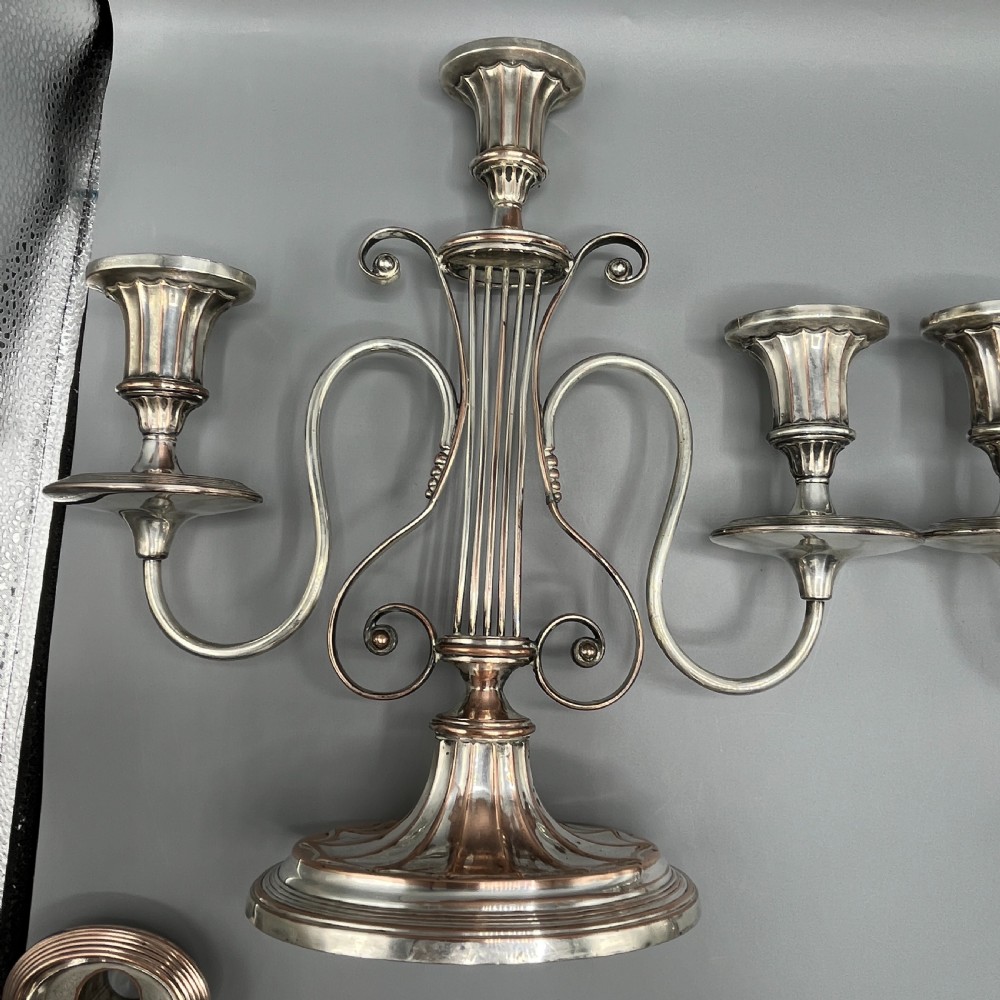 A pair of Georgian silver-plated three-light candelabra with lyre-shaped columns and scrolling branches. View XV