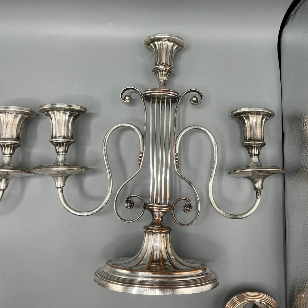 A pair of Georgian silver-plated three-light candelabra with lyre-shaped columns and scrolling branches. View XVI