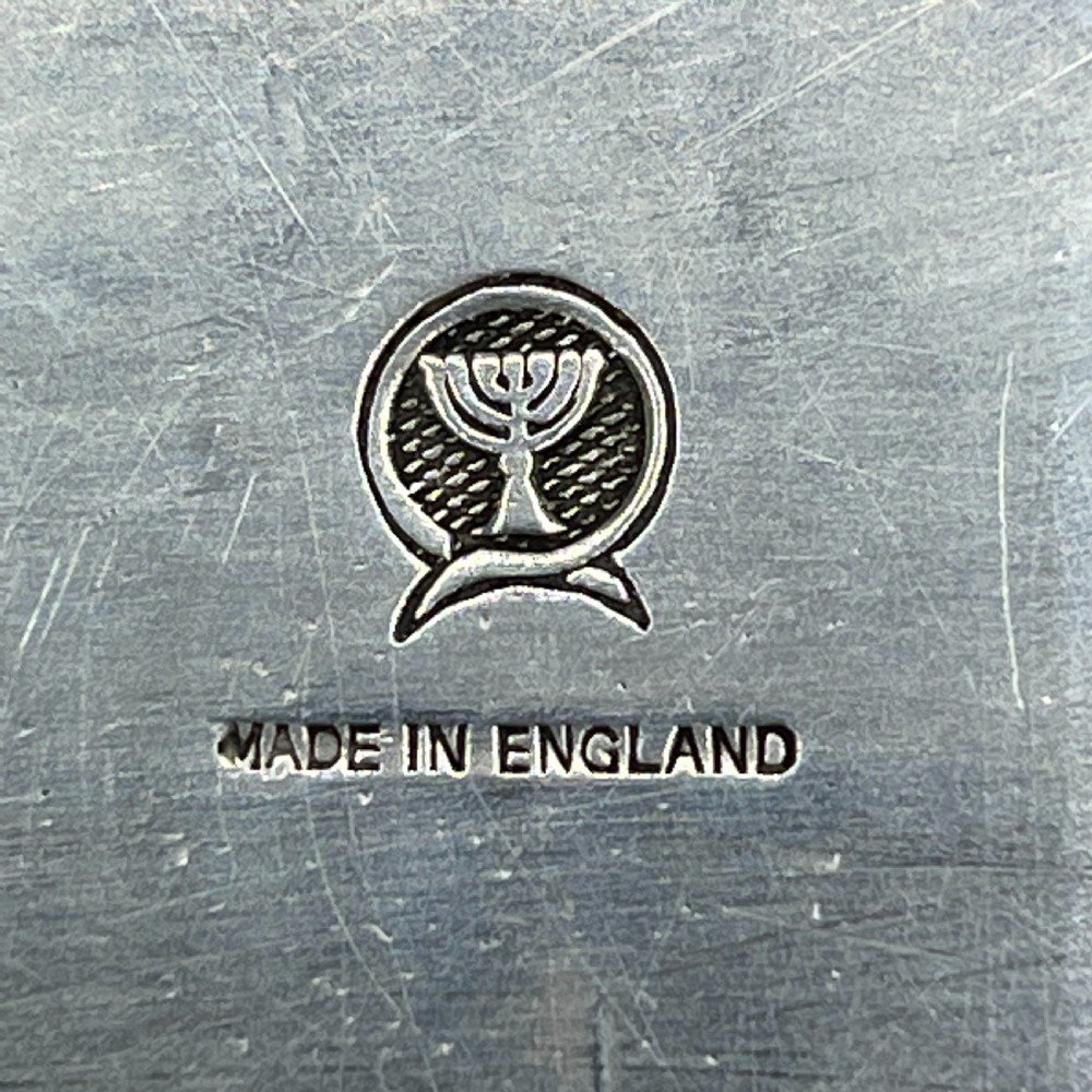 A large oval silver plated serving tray featuring twin scroll handles, a scalloped rim, and chased foliage patterns across the flat interior. View XXIII