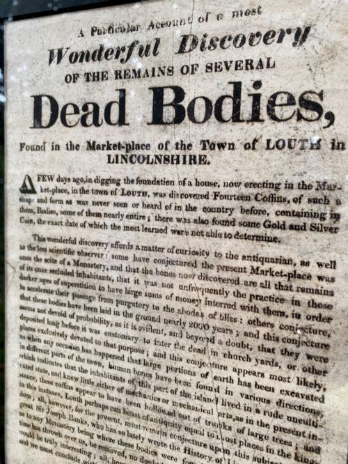 fig 1. An 1823 letterpress printed broadside notice titled regarding a discovery in Louth Lincolnshire, presented in a dark ebonised wooden frame.