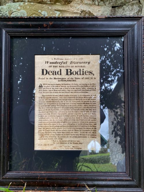 fig 3. An 1823 letterpress printed broadside notice titled regarding a discovery in Louth Lincolnshire, presented in a dark ebonised wooden frame.