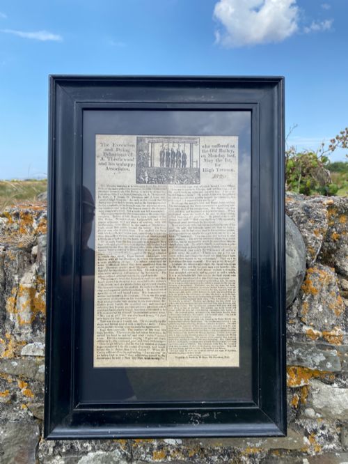 fig 1. A nineteenth-century printed paper broadside with a top woodcut depicting a gallows execution above double columns of letterpress text.