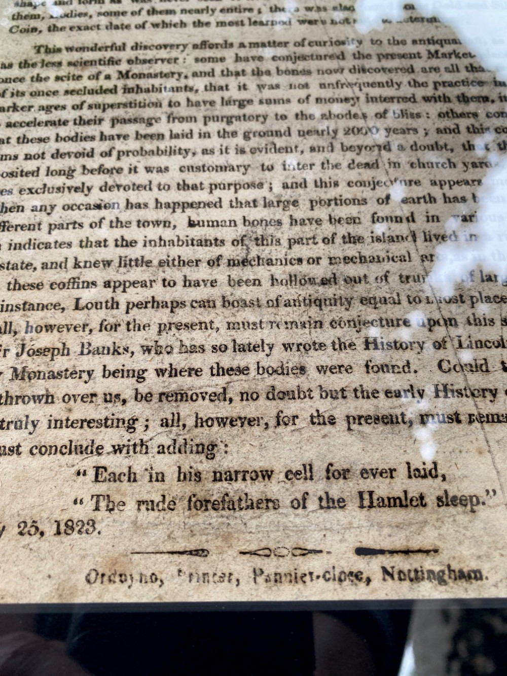 An 1823 letterpress printed broadside notice titled regarding a discovery in Louth Lincolnshire, presented in a dark ebonised wooden frame. View V