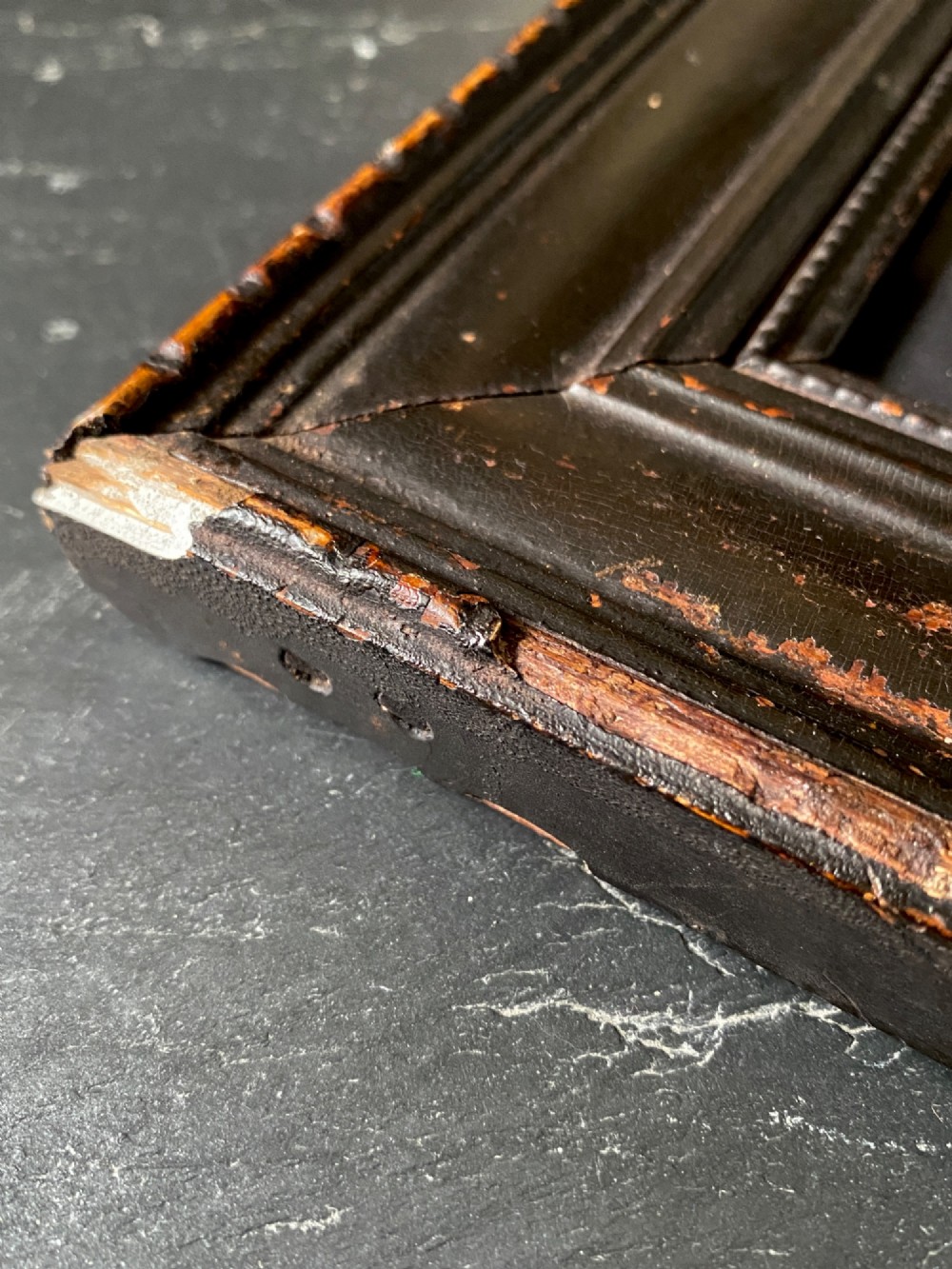 An 1823 letterpress printed broadside notice titled regarding a discovery in Louth Lincolnshire, presented in a dark ebonised wooden frame. View VII