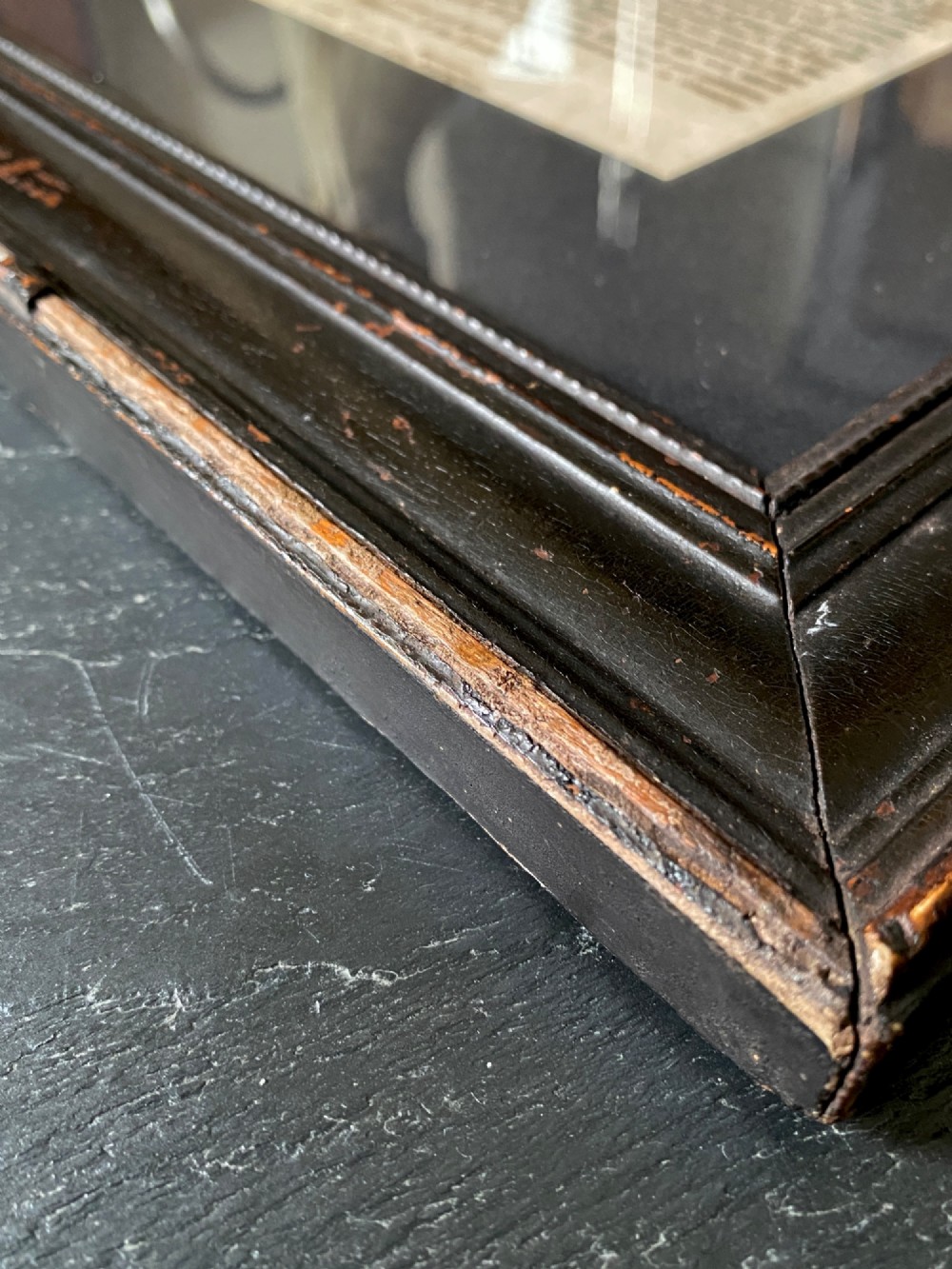An 1823 letterpress printed broadside notice titled regarding a discovery in Louth Lincolnshire, presented in a dark ebonised wooden frame. View VIII