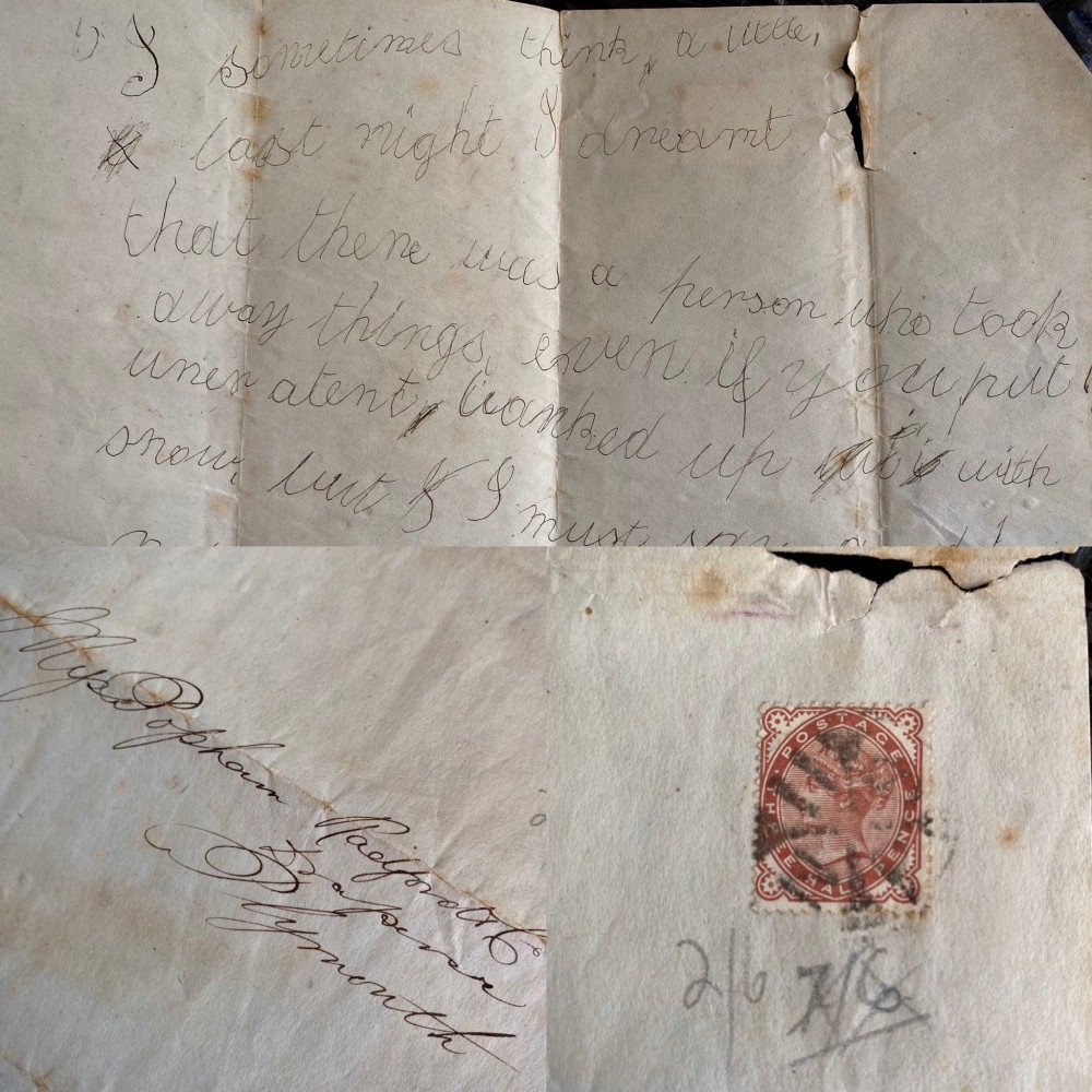 A folded 19th-century handwritten letter on creased cream paper with cursive script and a red Queen Victoria halfpenny postage stamp.