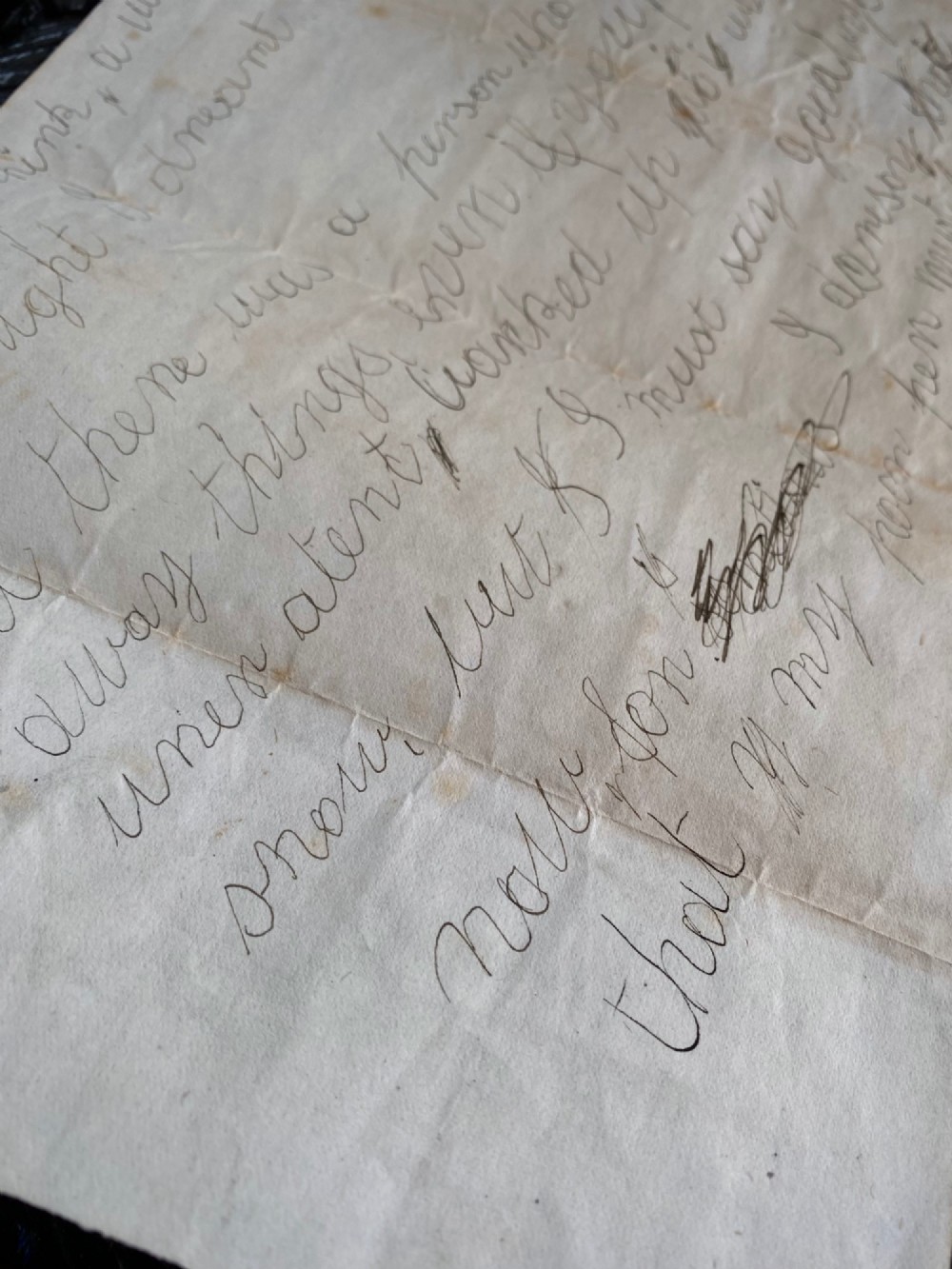 A folded 19th-century handwritten letter on creased cream paper with cursive script and a red Queen Victoria halfpenny postage stamp. View IX