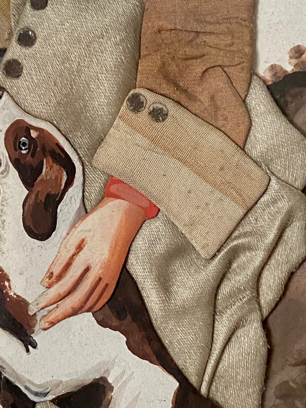 A late 18th-century Georgian folk art picture depicting a seated gamekeeper in fabric attire resting his hand on a spotted dog. View III