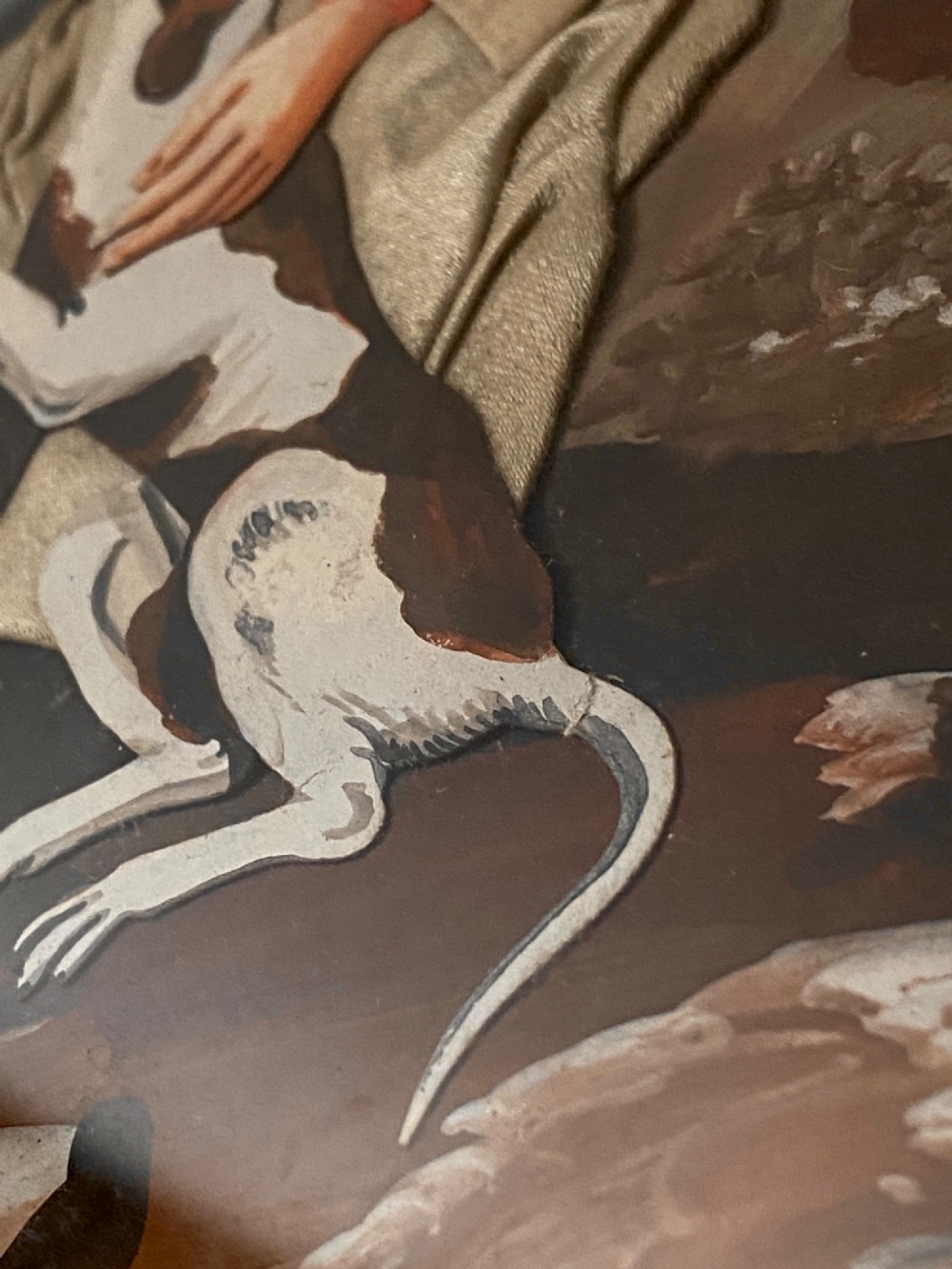 A late 18th-century Georgian folk art picture depicting a seated gamekeeper in fabric attire resting his hand on a spotted dog. View VI